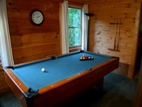 Smoky Mountain log cabin rental with a pool table.
